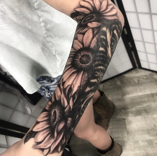 Explore man leg tattoo ideas, creative tattoo ideas in Johnson City, available at Gold Cross Tattoo Co.