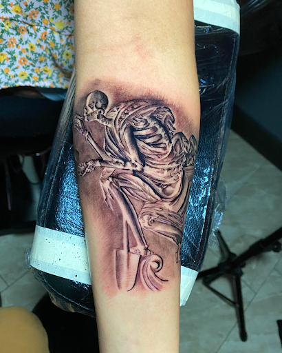 Explore hood neck tattoos ideas, creative tattoo ideas in Kissimmee, available at Ol Skool Tattoos Studio