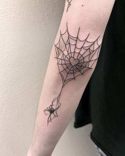 Explore tattoo room ideas, creative tattoo ideas in Cheyenne, available at The T.R.I.B.E. Zoo, LLC Tattoo