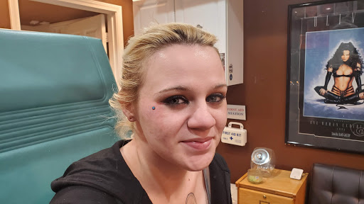 Explore record tattoo ideas, creative tattoo ideas in Myrtle Beach, available at Pitbull Tattoo and Piercing Clinic