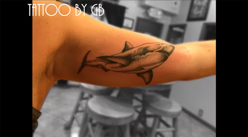 Explore thigh tattoo idea, creative tattoo ideas in Fort Myers, available at Needful Things Inc