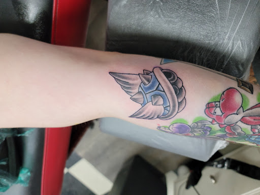 Explore sun tattoo ideas, creative tattoo ideas in Green Bay, available at Sonic Tattoos