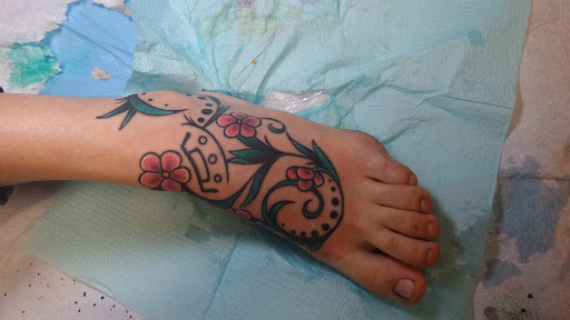 Explore unique semicolon tattoo ideas, creative tattoo ideas in Austin, available at Little Pricks Tattoo