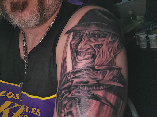 Explore red ink neck tattoo ideas, creative tattoo ideas in Beaverton, available at Tattoo 42