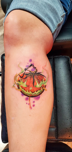 Explore iris flower tattoo ideas, creative tattoo ideas in Kalispell, available at Swindler Ink