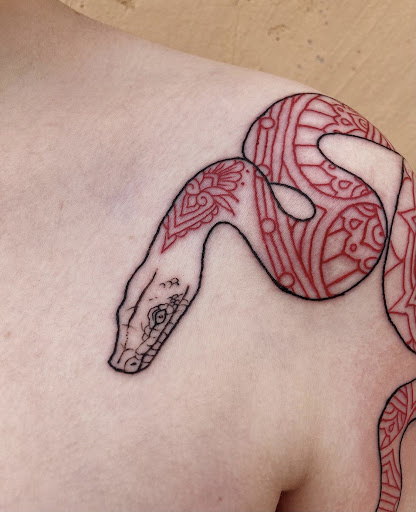 Explore simple flower tattoo ideas, creative tattoo ideas in Carefree, available at Lucid Arts - Design & Tattoo