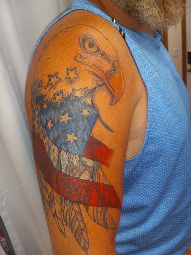 Explore rammstein tattoo ideas, creative tattoo ideas in Kewanee, available at Splat Ink tattoos and piercings