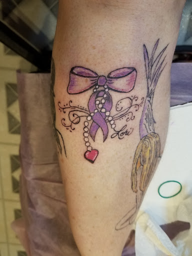 Explore ladybug tattoo ideas, creative tattoo ideas in Davis, available at SIX GUN SOUND TATTOO