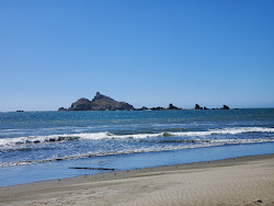 Photo de Pebble Beach avec rivage droit, long