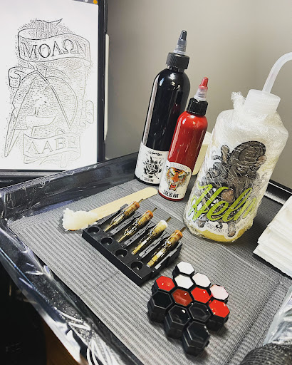 Find cat tattoo ideas female for your next unique tattoo in Fort Oglethorpe at The Helm Tattoo & Piercing