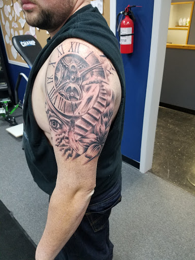 Tattoo Shop «Next Level Tattoo Company - Imlay City», reviews and photos, 420 E 3rd St, Imlay City, MI 48444, USA