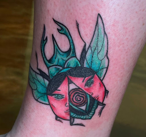 Explore shoulder tattoo ideas for females, creative tattoo ideas in Marietta, available at The Queen Bee Tattoo and Piercing Parlour