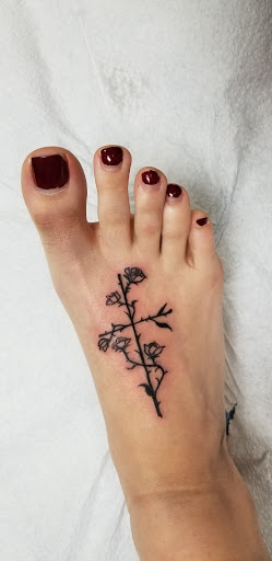 Explore dark hand tattoo ideas, creative tattoo ideas in Marietta, available at Sink or Swim Studio and Gallery