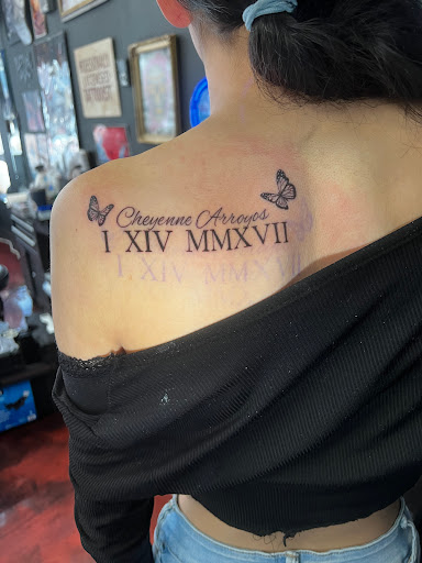 Explore 2 child tattoo ideas for dad, creative tattoo ideas in Silver City, available at Independent Ink Tattoo