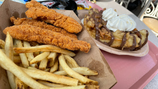 Chicken tender and chocolate funnel cake.