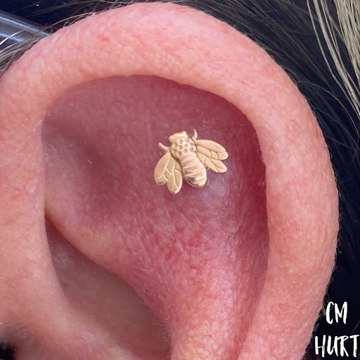 Explore skull rose tattoo ideas, creative tattoo ideas in Garden Grove, available at CM Hurt Piercing & Jewelry