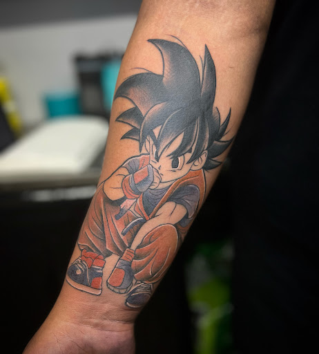 Explore batman logo tattoo ideas, creative tattoo ideas in Camden, available at Greywash Tattoo LLC