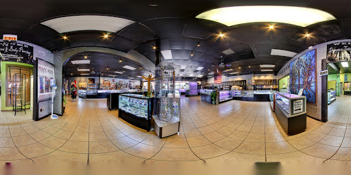 Tattoo Shop «Dungeon Body Piercing & Tattoos», reviews and photos, 10014 University Blvd, Orlando, FL 32817, USA