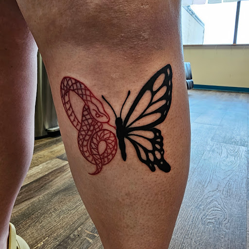 Explore neck tattoo ideas, creative tattoo ideas in Traverse City, available at Pinups & Needles