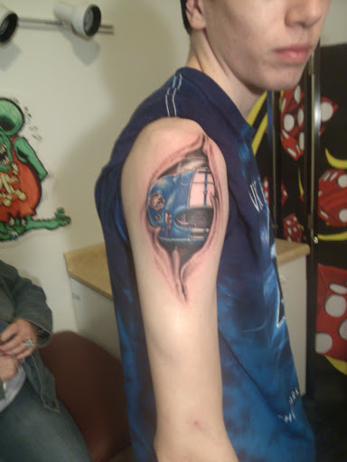 Explore kaws tattoo ideas, creative tattoo ideas in Hebron, available at Explosive Ink Tattoo