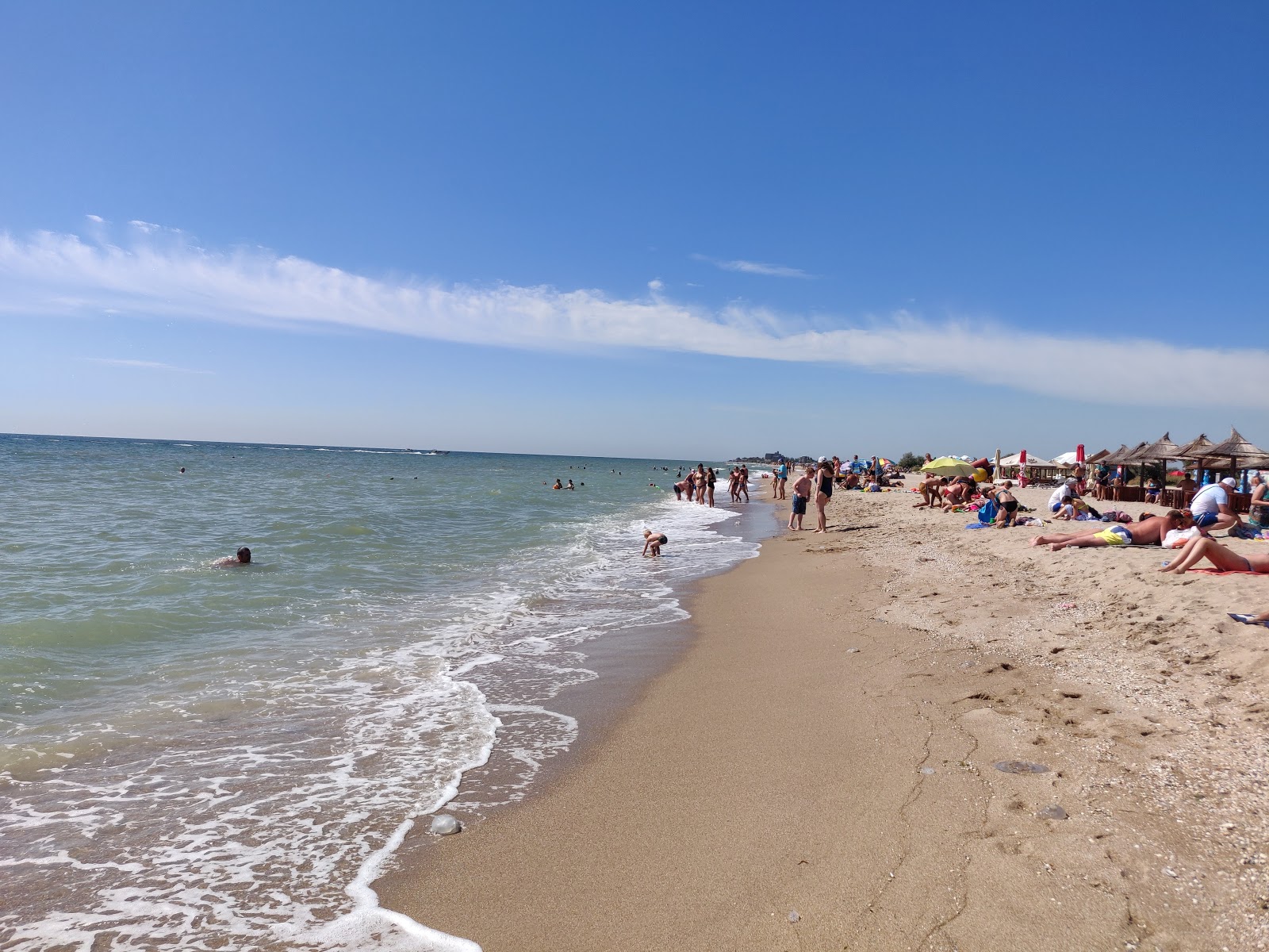 Foto von Verkhova Dykyy Plyazh mit heller sand Oberfläche