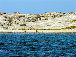 Isola Piana Beach'in fotoğrafı doğal alan içinde bulunmaktadır