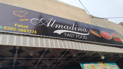 Almadina Fast Food - C4V8+X9V, Jhumra Rd, Manzoor Park, Faisalabad, Punjab, Pakistan