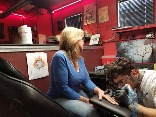Tattoo Shop «Quality Ink -Tattoo and Piercing Studio», reviews and photos, 3604 Fort Crook Rd S, Bellevue, NE 68123, USA