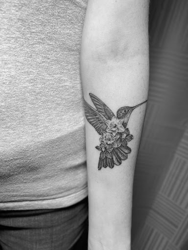 Find time clock tattoo ideas for your next unique tattoo in Springboro at Ink by Erin Ironside Tattoo Studio