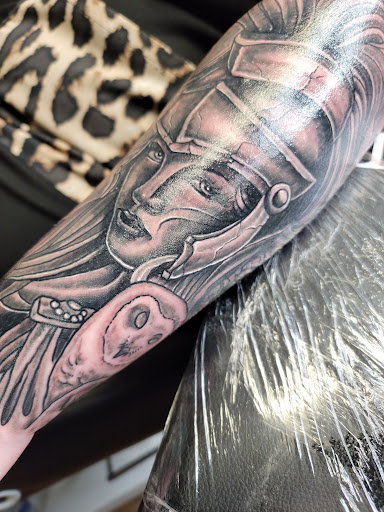 Explore the world is yours tattoo ideas, creative tattoo ideas in Clarksville, available at Love Blood Ink Tattoo