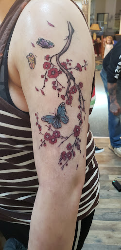 Explore aa tattoo ideas, creative tattoo ideas in Cornelia, available at Prismatic Pulse Tattoo