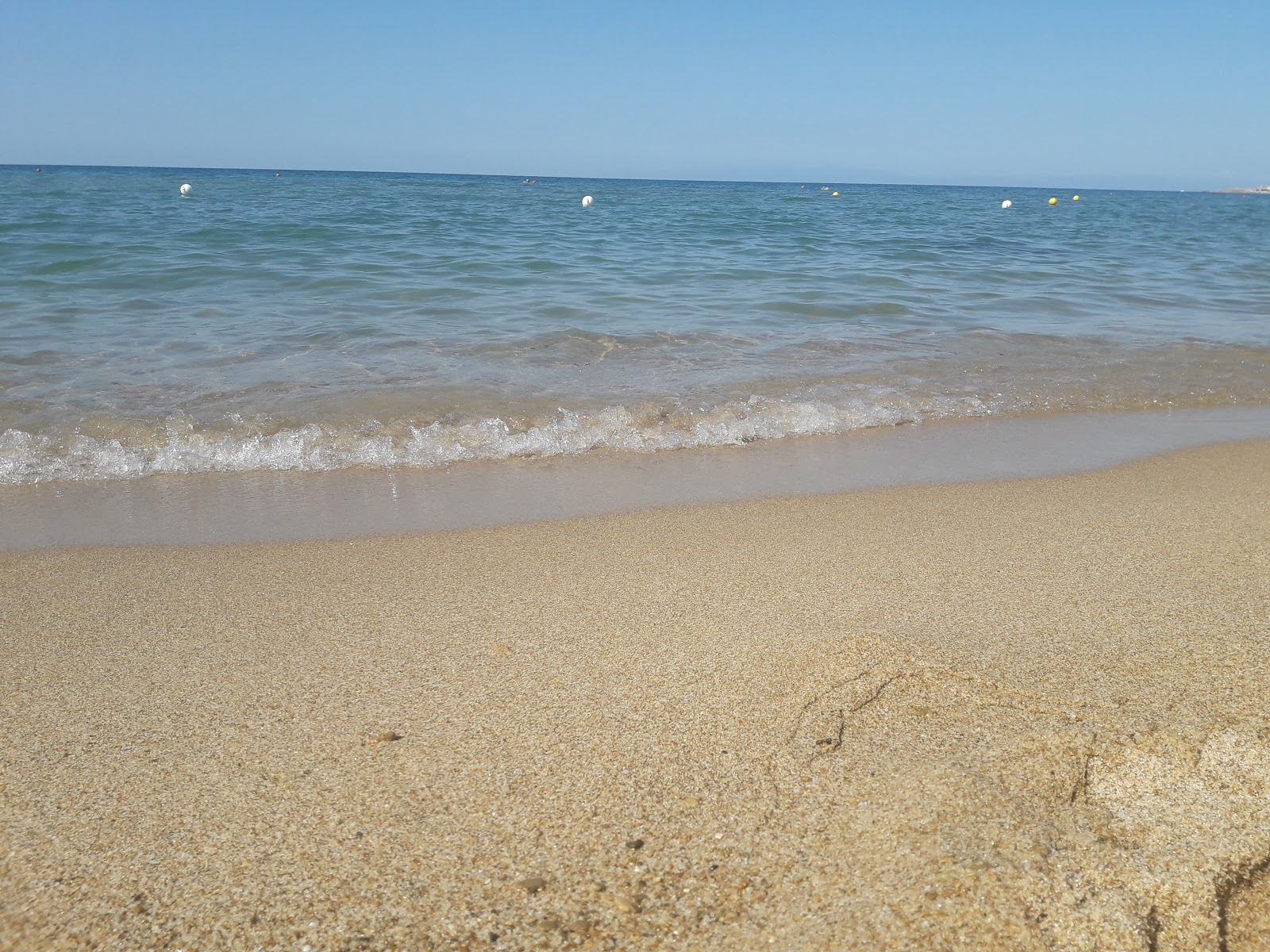 Foto van Fiume Capo beach met ruim strand