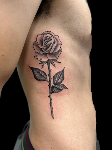 Explore angel neck tattoo ideas, creative tattoo ideas in Scranton, available at Black Sheep Tattoo & Piercing Studio