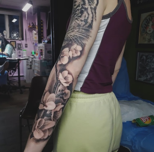 Find mama tattoo ideas for your next unique tattoo in Clayton at Sinful Art Tattoo