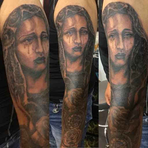 Explore never give up tattoo ideas, creative tattoo ideas in Malvern, available at NeckBoneInk Tattoo&Gallery