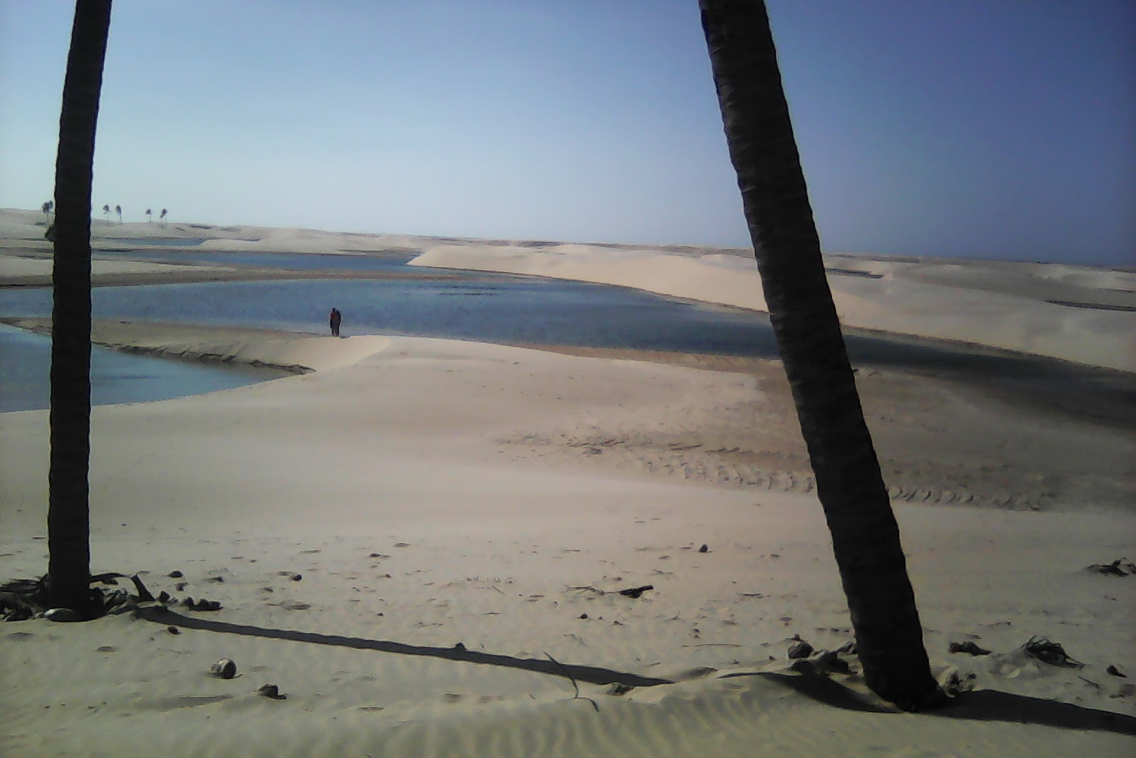 Foto van Praia do Amor met turquoise puur water oppervlakte