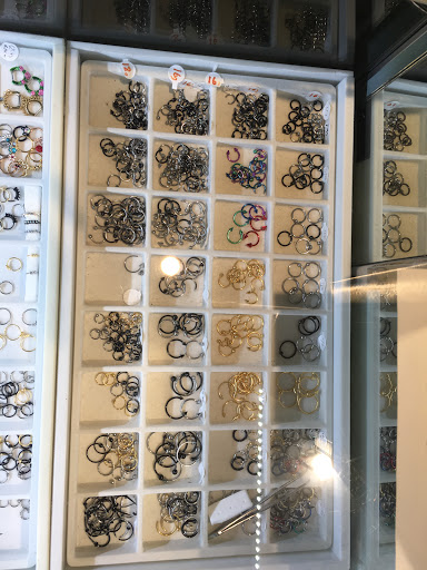 Explore badass neck tattoo ideas, creative tattoo ideas in Buena Park, available at Lucky Body Jewelz