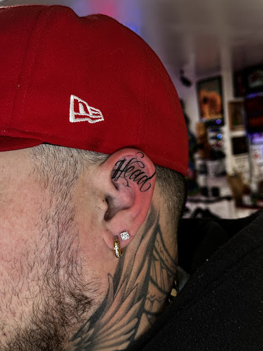 Explore arsenal tattoo ideas, creative tattoo ideas in Honolulu, available at Sacred Art Tattoo Waikiki
