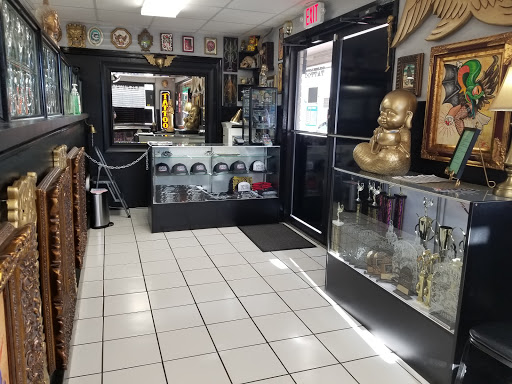 Tattoo Shop «Golden Lotus Tattoo Studio», reviews and photos, 3901 E Kiehl Ave C, Sherwood, AR 72120, USA