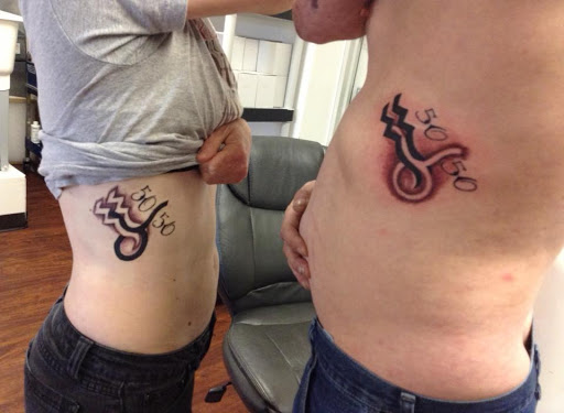 Explore back cover up tattoo ideas, creative tattoo ideas in Seymour, available at American Gypsy Tattoo Corp.