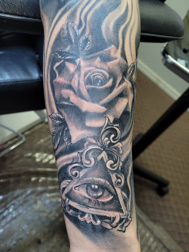 Explore resident evil tattoo ideas, creative tattoo ideas in Angola, available at Hoodlum Ink