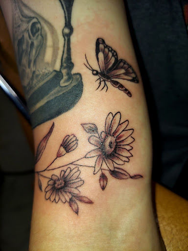 Explore floral sleeve tattoo ideas, creative tattoo ideas in Odessa, available at Little Dragon Tattoos Studio