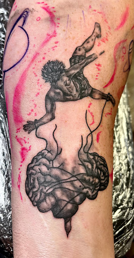 Explore mens quad tattoo ideas, creative tattoo ideas in Clarksville, available at Dark Raine Tattoo