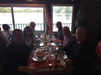 Atmosphère du Restaurant français L'Etang Fleuri à Vert-le-Petit - n°11