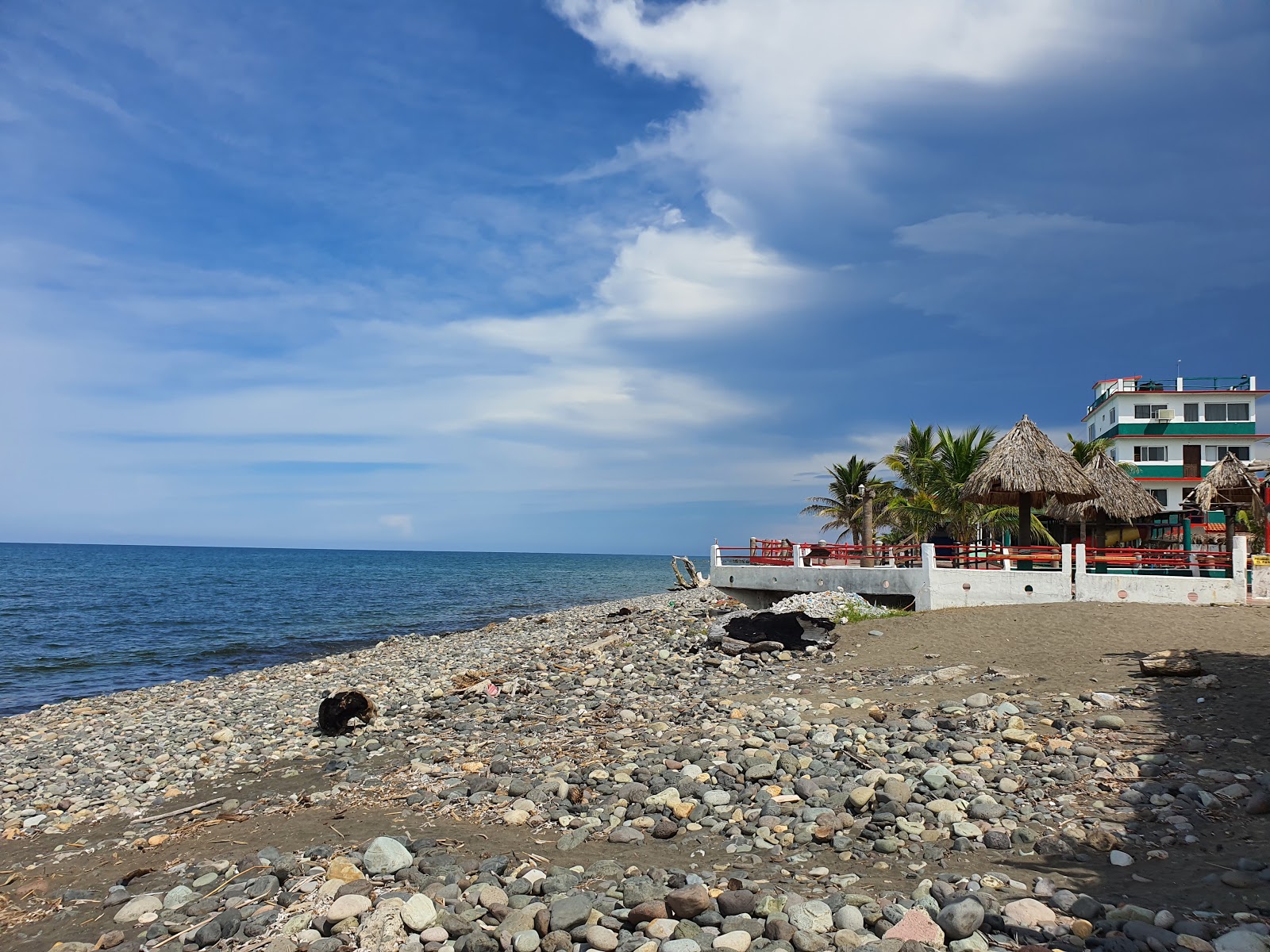 Photo of Playa Lechuguillas with gray pebble surface