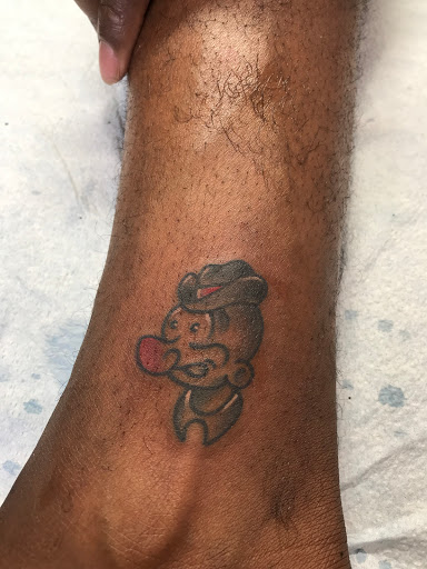 Explore chanel tattoo ideas, creative tattoo ideas in Libertyville, available at Lucky Seven Tattoo