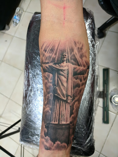 Explore tattoo sleeve filler ideas for a man, creative tattoo ideas in Fontana, available at Iconiq Tattoo Studio