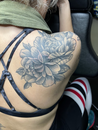 Explore half sleeve tattoos womens ideas, creative tattoo ideas in Elyria, available at Distilled Ink Tattoo Parlor