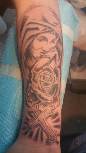 Explore mens travel tattoo ideas, creative tattoo ideas in Louisville, available at Creative Ink Tattoo Studio