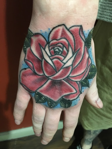 Explore fine line finger tattoo ideas, creative tattoo ideas in Kingsford, available at Deft Tattoo Studio